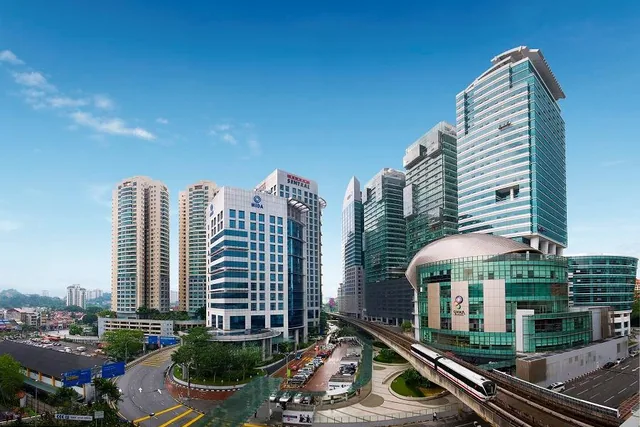KL Sentral, two LRT stations from Abdullah Hukum