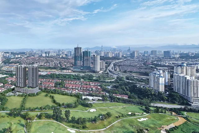 Bukit Jalil homes and towers from above, with the city behind