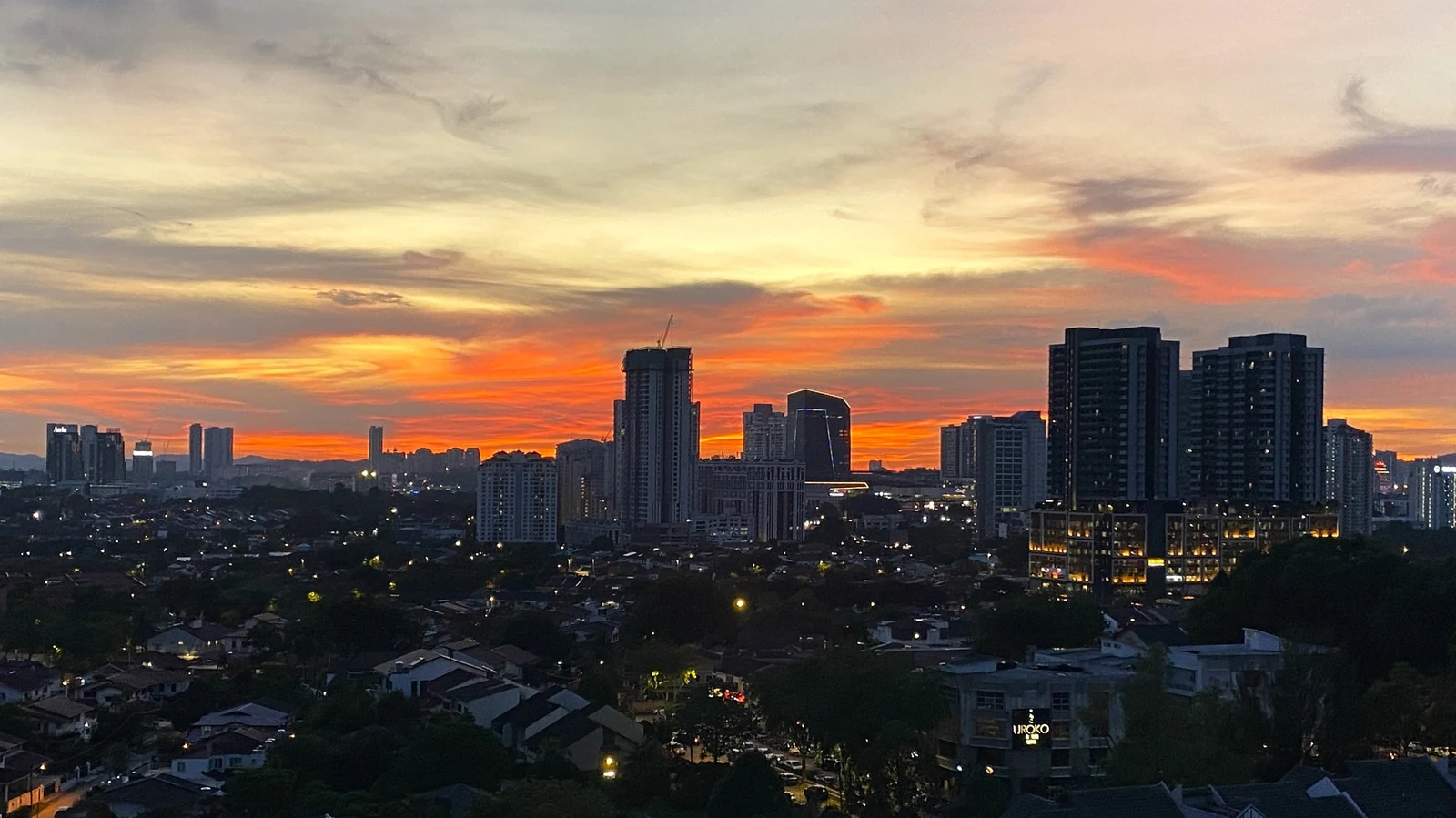 Petaling Jaya skyline at sunset over its low-rise neighbourhoods