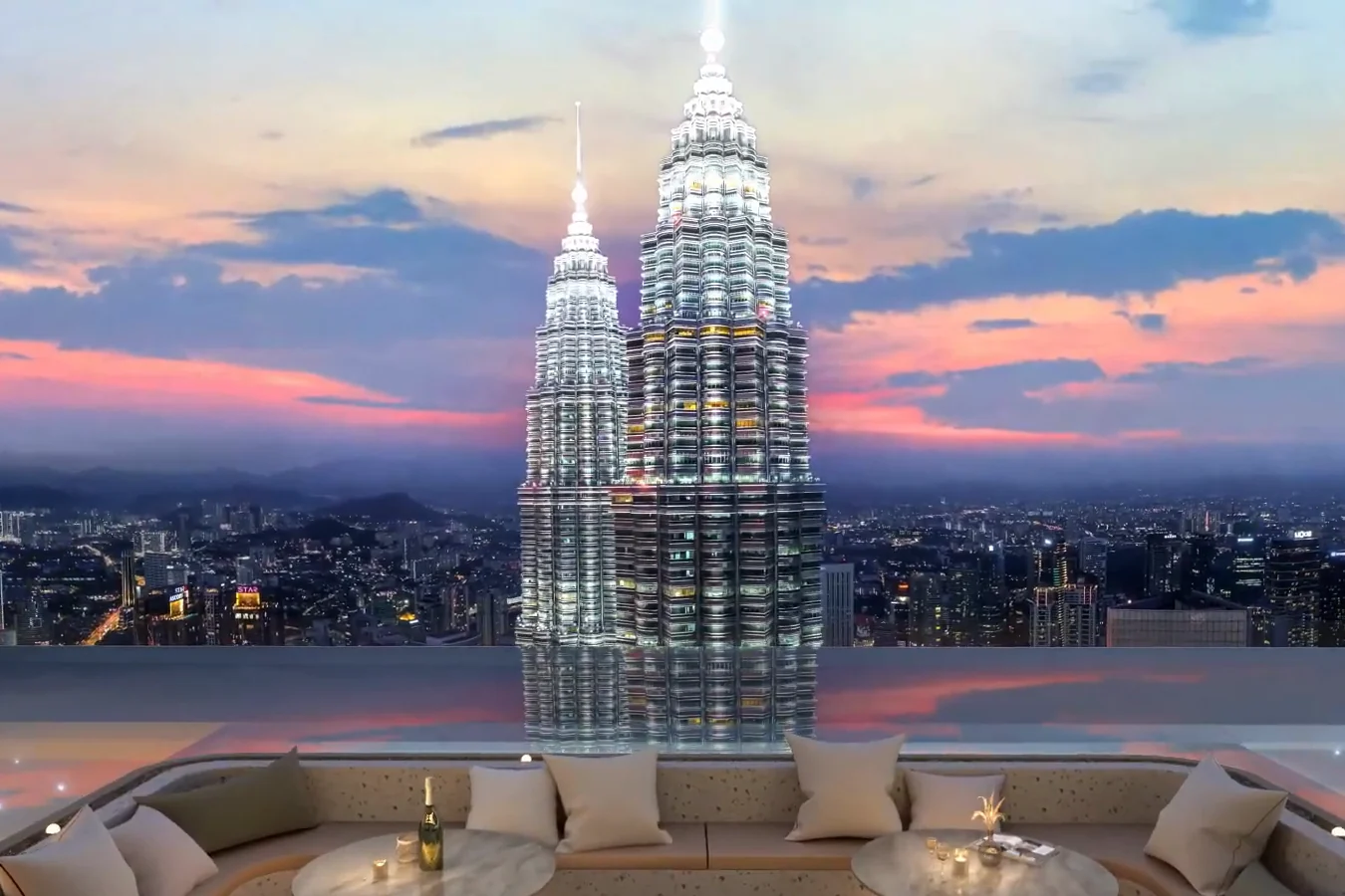 Floating lounge at the Level 64 sky pool facing the Petronas Twin Towers, CloutHaus Residences