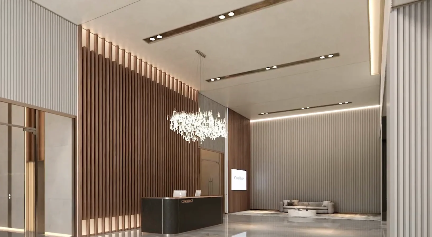 Reception lobby with a crystal chandelier and the concierge desk at CloutHaus Residences