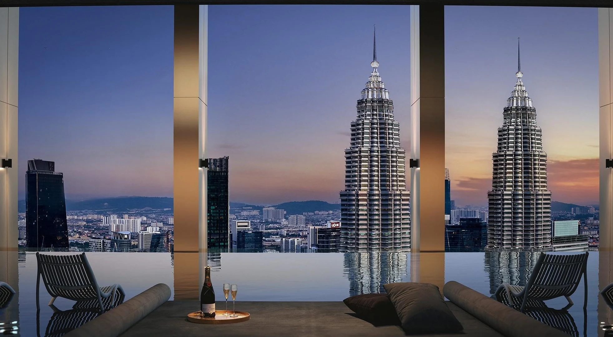 The infinity lap pool on Level 79 of Divine KLCC, facing the Petronas Twin Towers