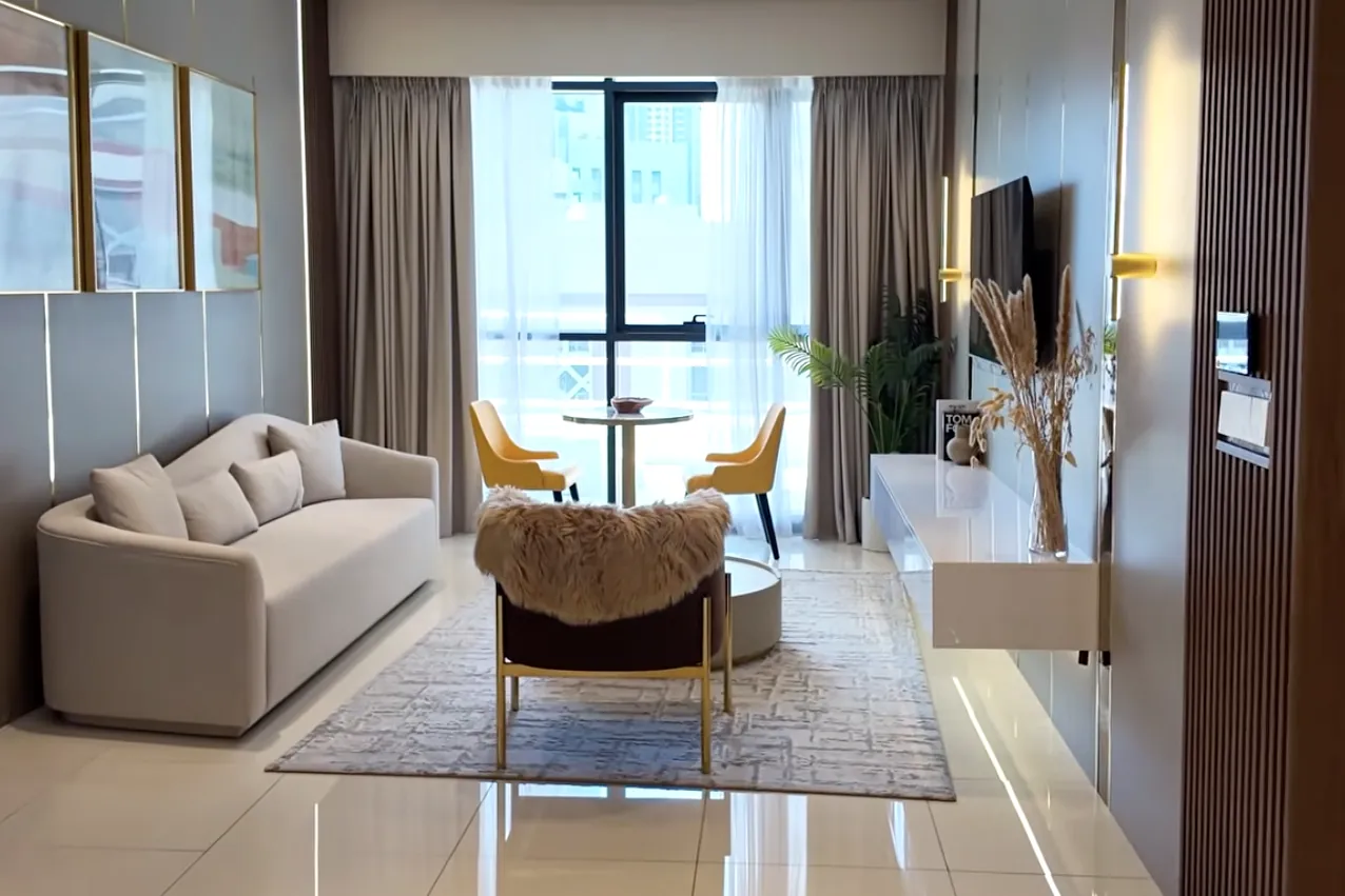 Living and dining room by the window in the Golden Crown Residence model home