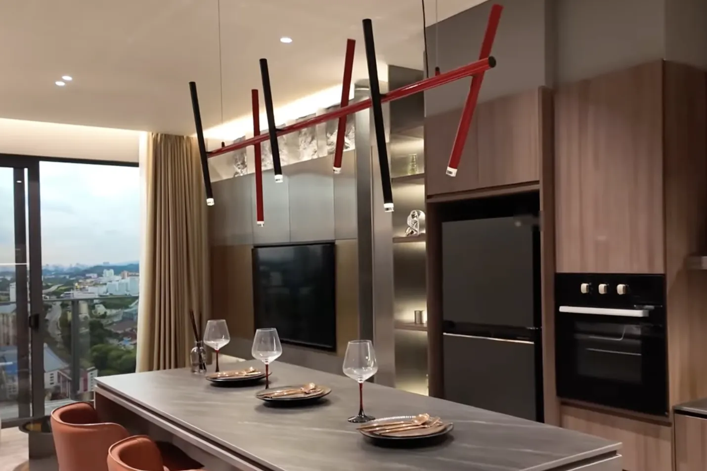 Kitchen island with bar seating in a Khaya Residences show unit