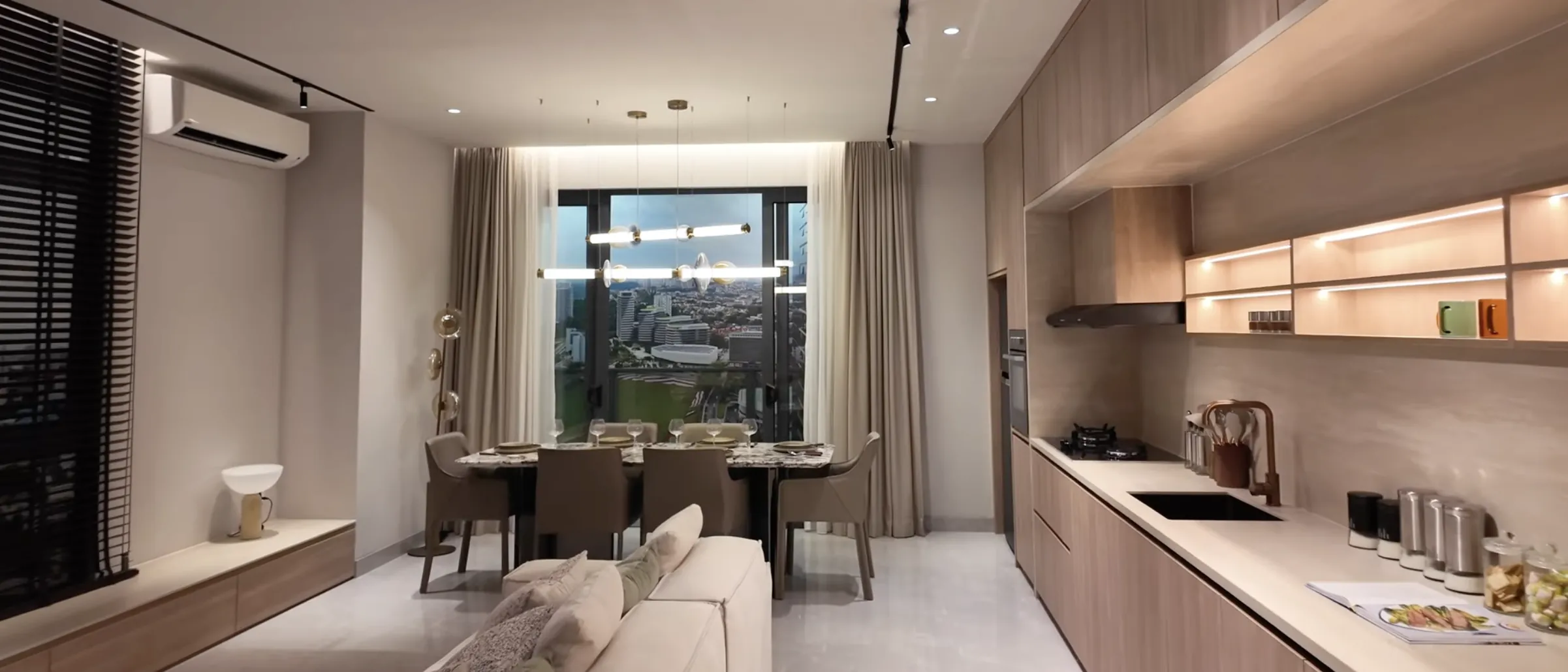 Khaya Residences show unit living, dining and kitchen