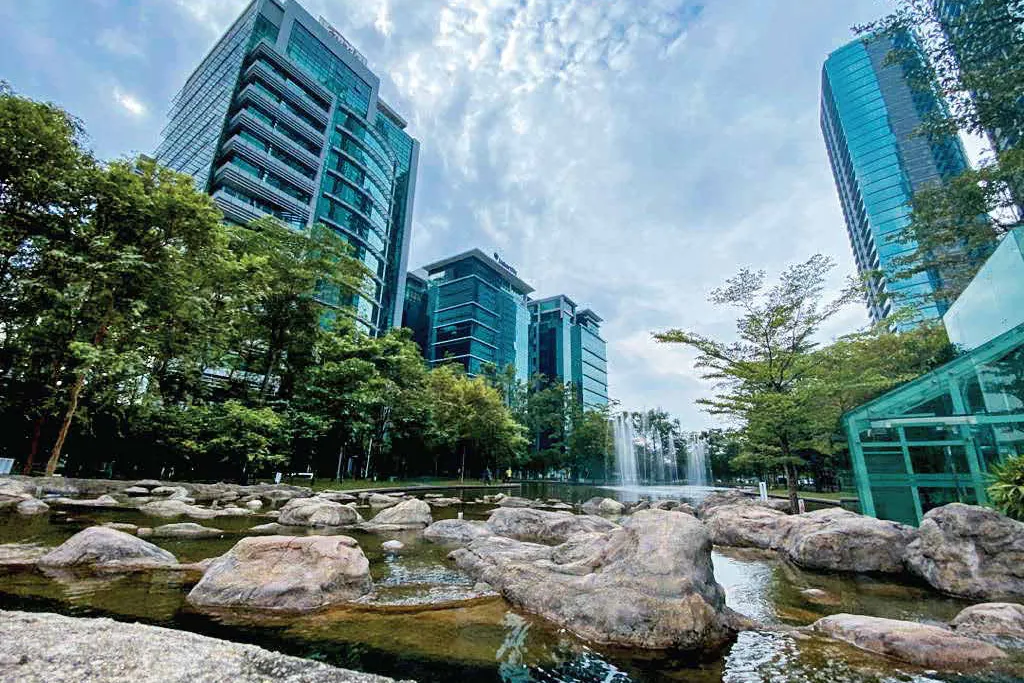 Office towers around the park and lake in Bangsar South
