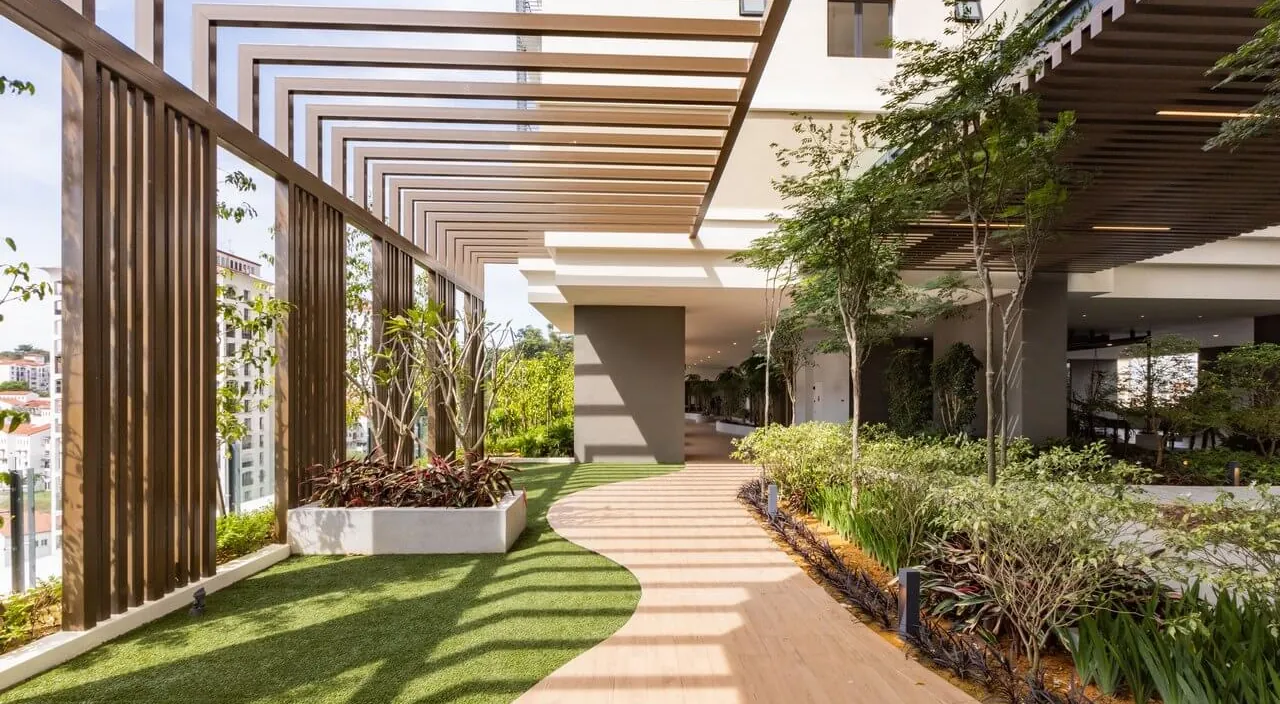 A path under the pergola by the Zen yoga deck at Laurel Residence