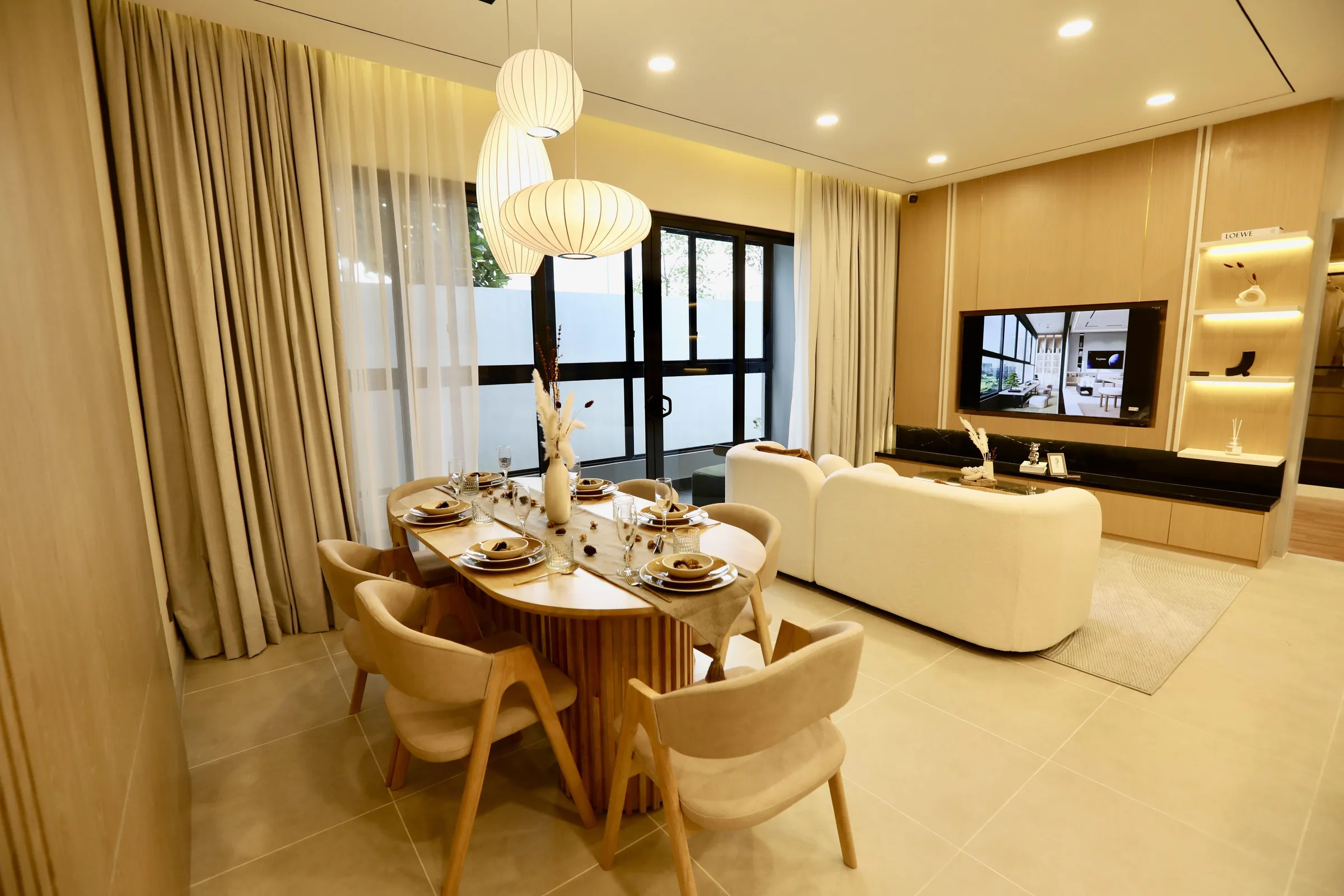 A show unit living and dining room at OAKA Residences