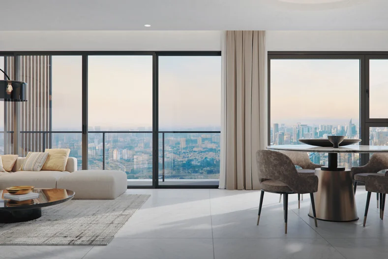 A Parkside Residences living and dining room with a view of the city