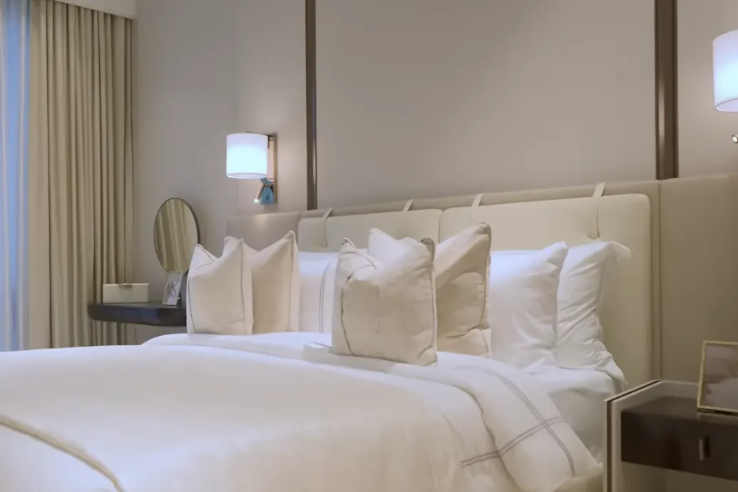Pavilion Square show unit bedroom with full-height curtains