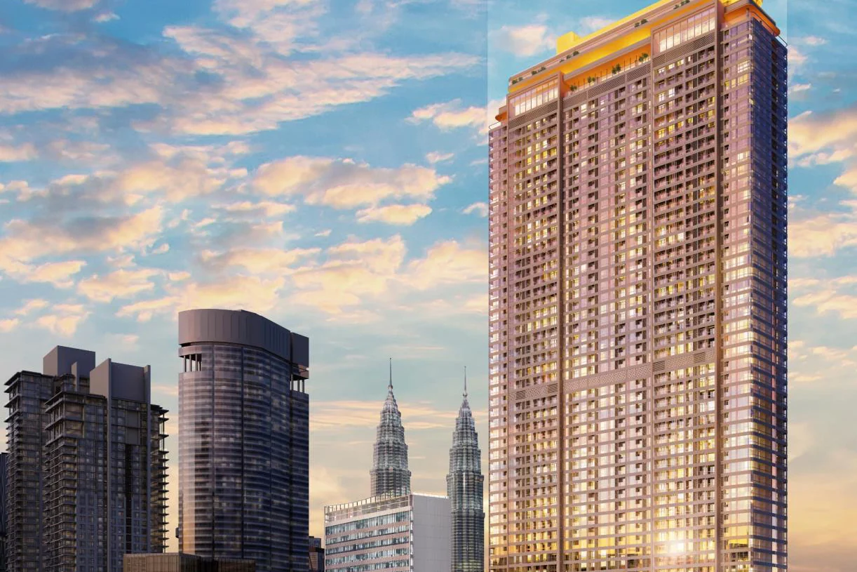 Pavilion Square residential tower at dusk, with the Petronas Twin Towers