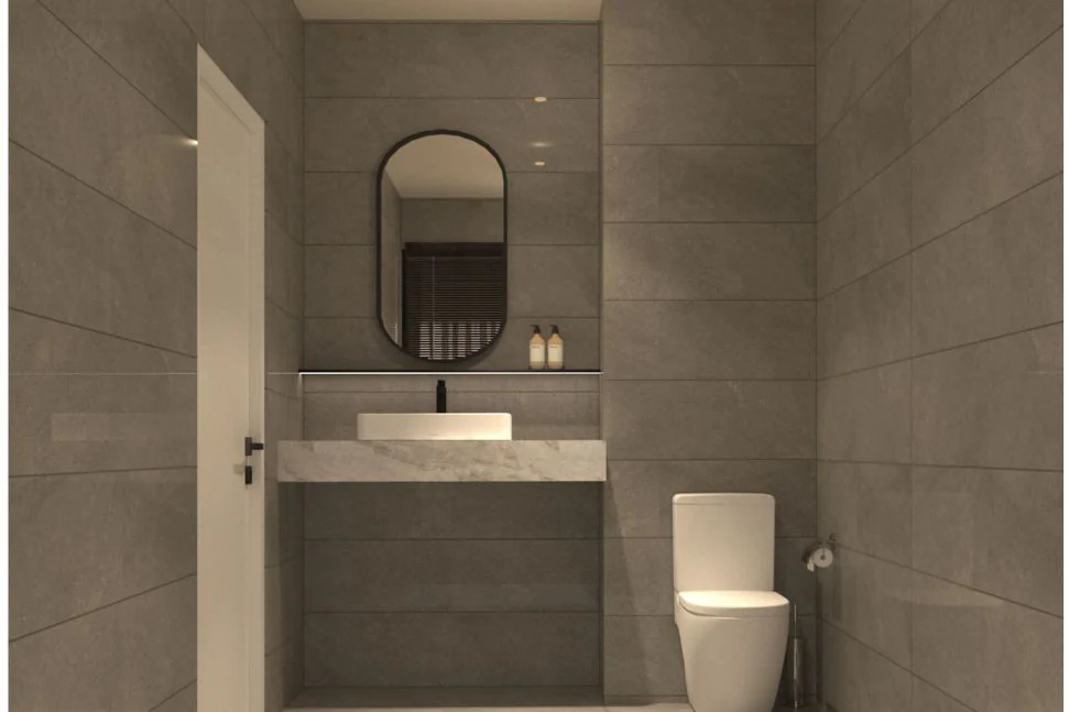Bathroom in grey stone tile in the walnut design concept for Phoeniz Suites