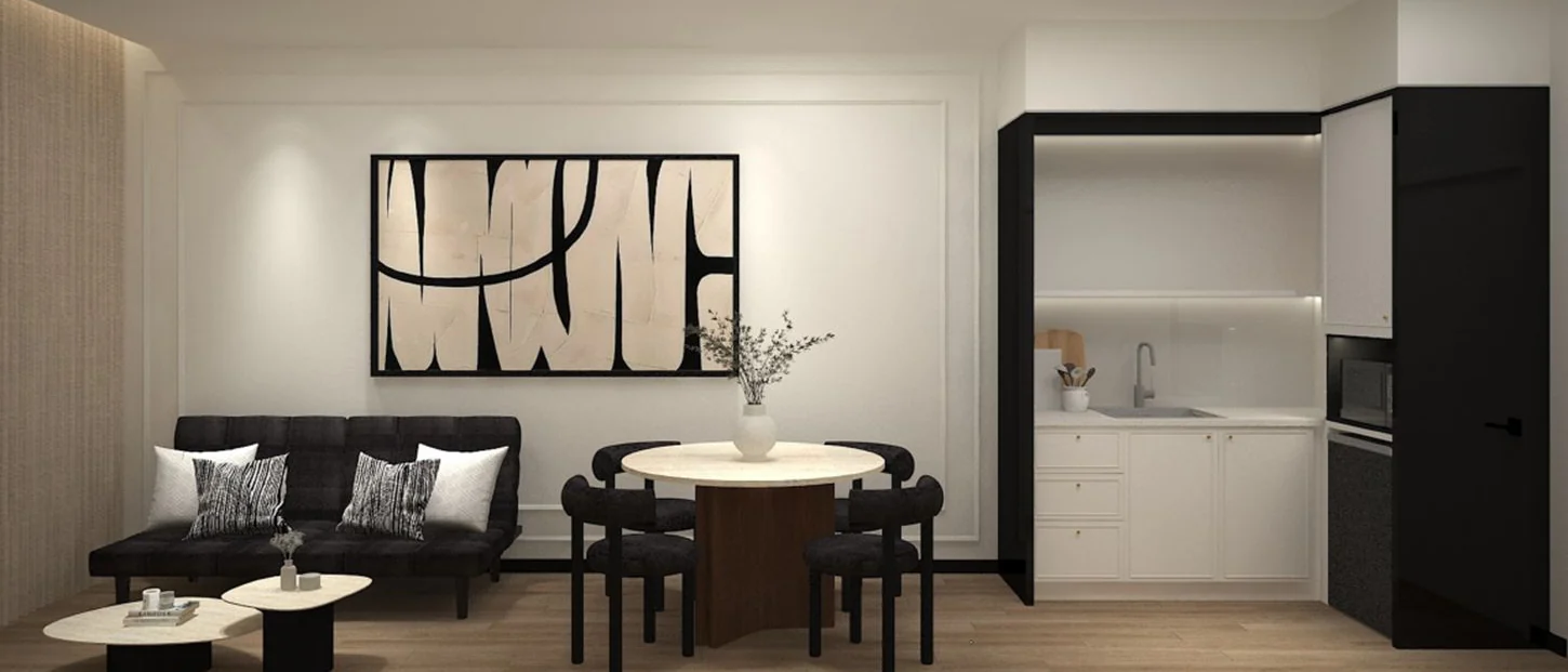 Living and dining area with a pantry in the black-and-ivory design concept for Phoeniz Suites