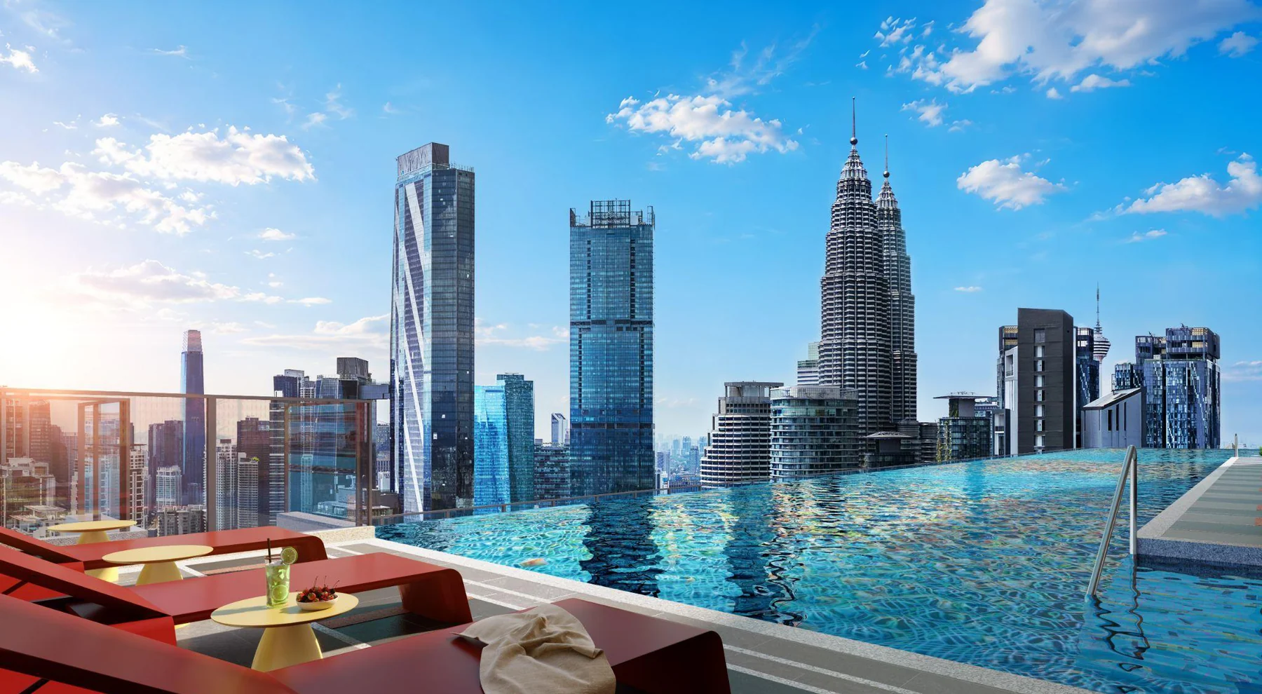 The Sky Pool on Level 52 of Phoeniz Suites by day, with the Petronas Twin Towers