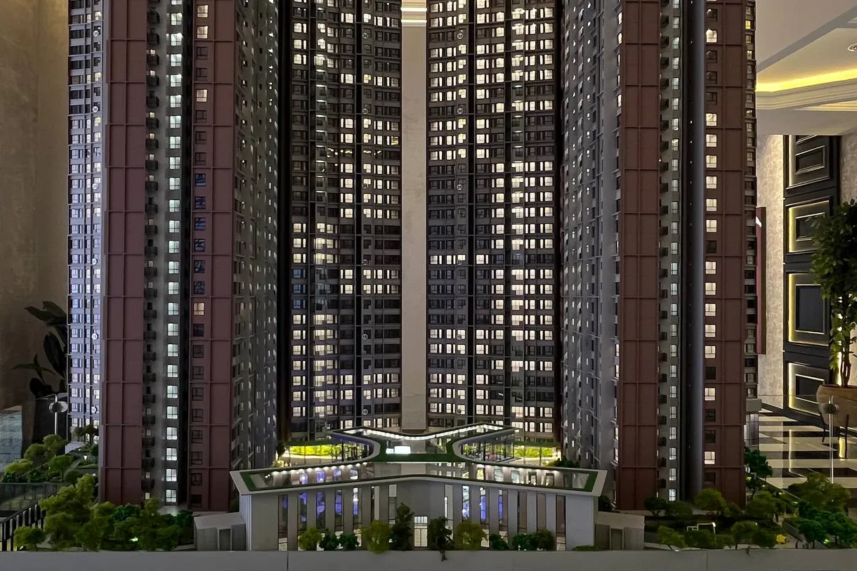 The scale model of The Queenswoodz towers and podium