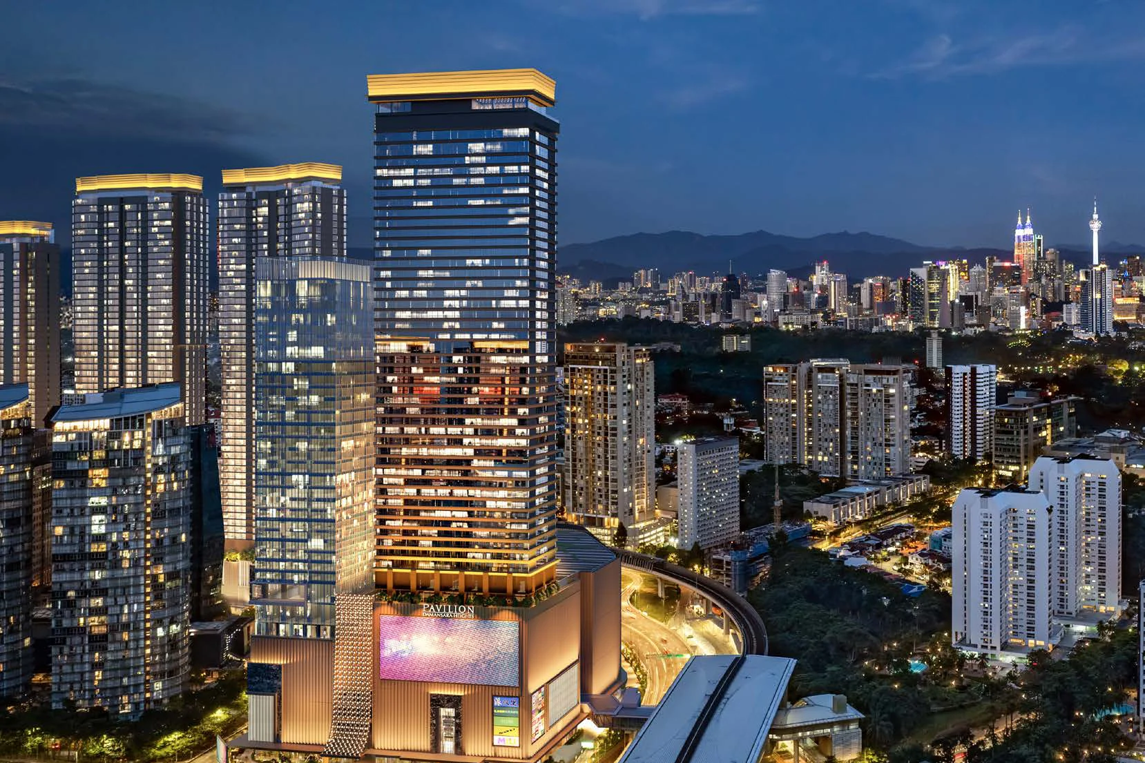 Pavilion Damansara Heights towers and mall at night, with the MRT station in front, artist’s impression