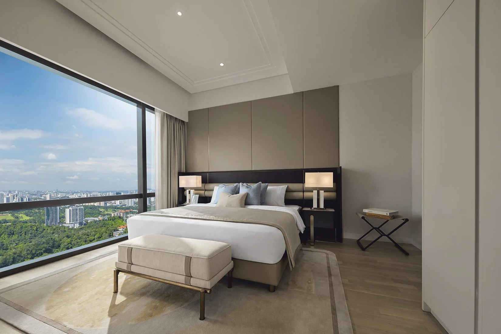 Royal Suites Damansara Heights Type J2 master bedroom with full-height glass facing Bukit Kiara