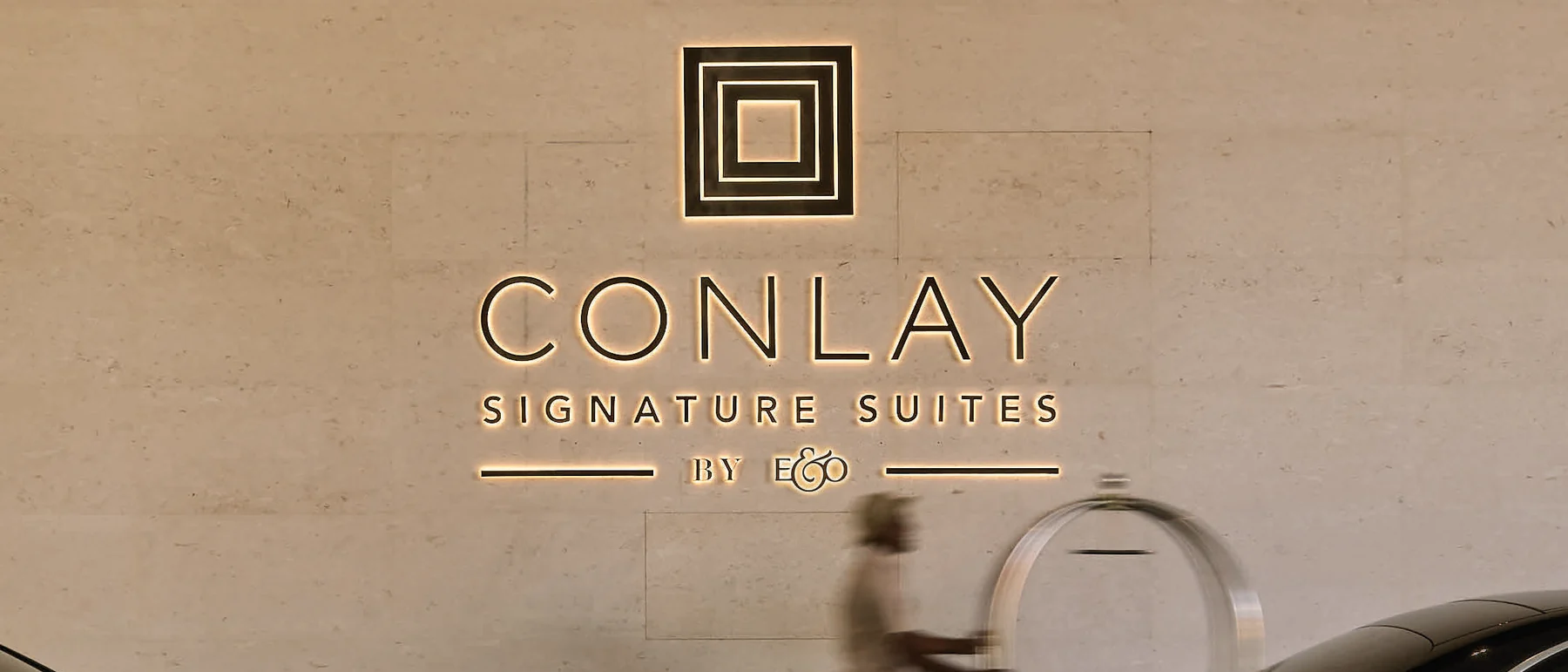 Car drop-off at The Conlay Signature Suites entrance, KL City Centre