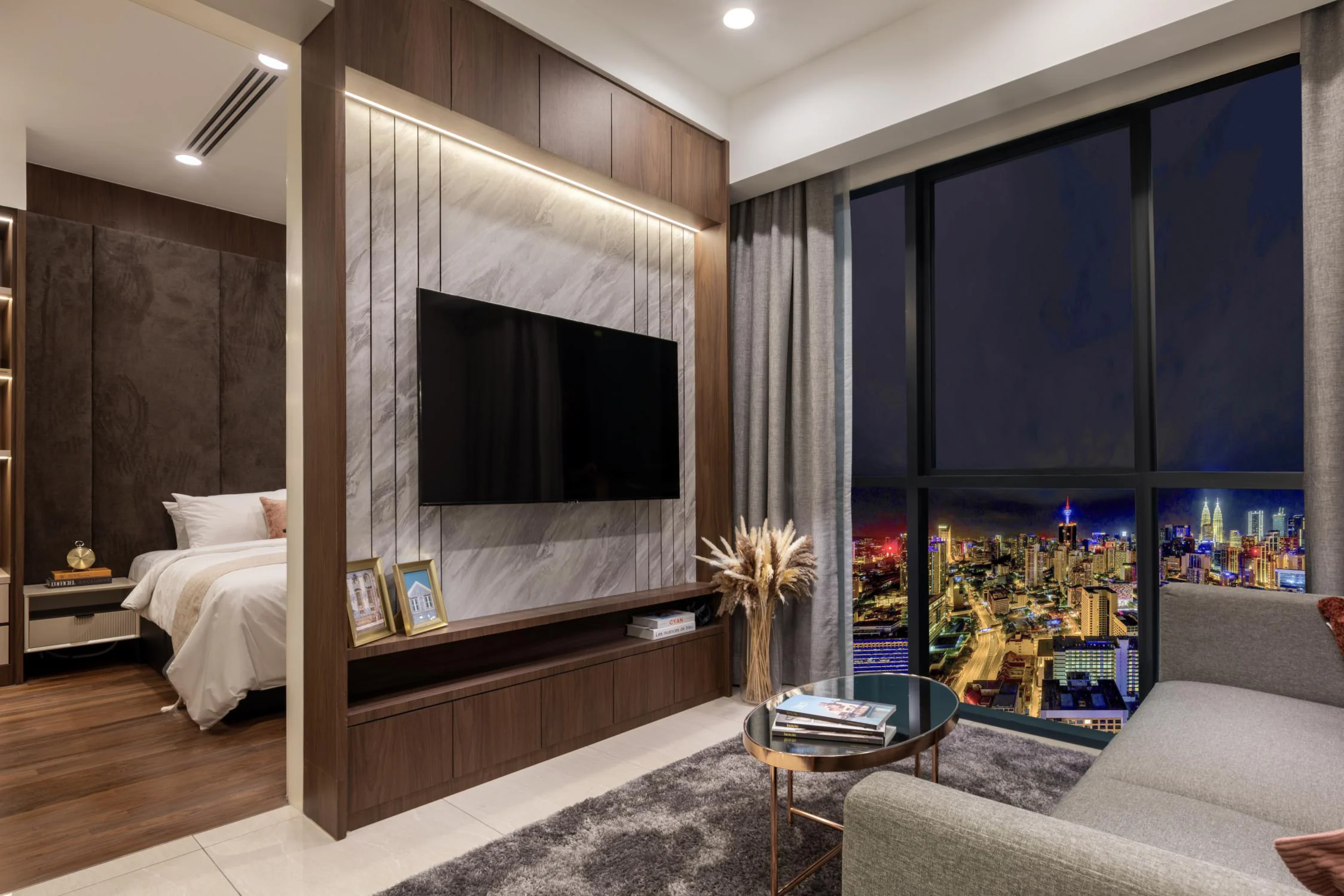 A bedroom with a city view at night in a design concept for Times Square 2