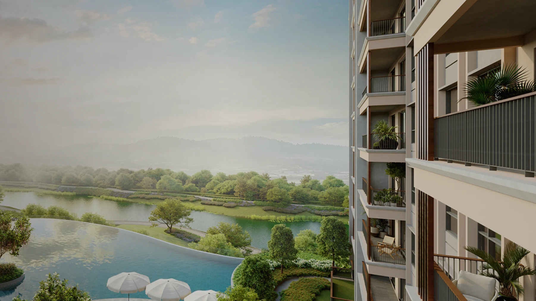 View over the pond and hills from a Zenia Condovillas balcony at ParkCity Damansara