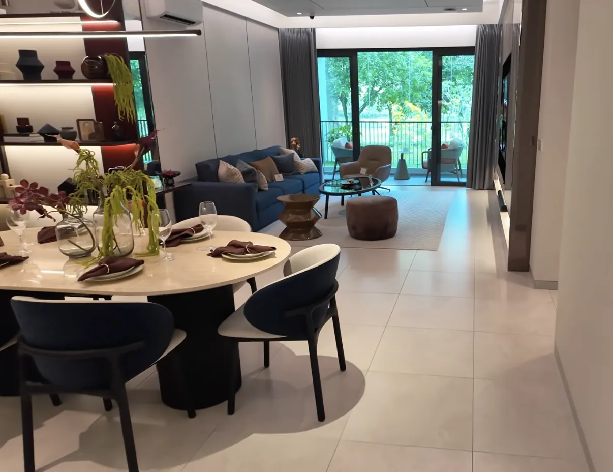 Zenia Condovillas Petaling Jaya show unit living and dining room with glass doors to the greenery